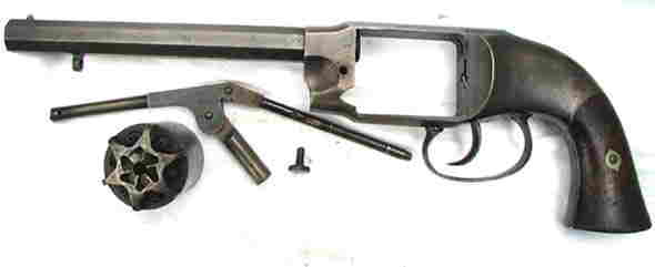 LEFT SIDE VIEW OF THE PETTENGILL ARMY REVOLVER WITH THE COMBINATION LOADING LEVER / CYLINDER ARBOR MECHANISM, THUMB SCREW AND CYLINDER REMOVED