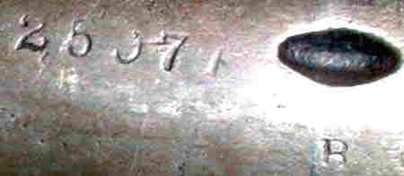 Close Up of Cylinder Serial Number "25974" And "R" on Cylinder And Oval Cylinder Stop